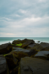 Seascape of Beach And Jetty Rocks On A Cloudy Day In Holgate, NJ New Jersey Long Beach Island LBI
