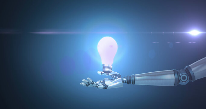 Image of illuminated light bulb over hand of robot arm, with moving light on dark background