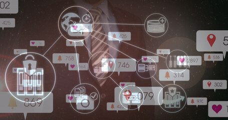Image of social media icons and numbers over businessman touching interactive screen