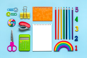Frame from school and office supplies Paper clips, pens, calculator, sharpener, notepad, stapler...