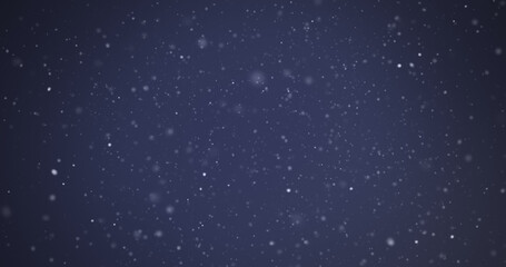 Image of white spots moving on blue background
