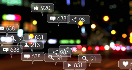 Image of social media icons and numbers over road traffic and cityscape lights