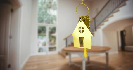 Animation of gold key and key ring over blurred house interior - Powered by Adobe