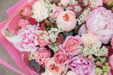 Floral backdrop, background. Flowers in bloom. White red pink bouquet with roses, peony close-up, details, texture	
