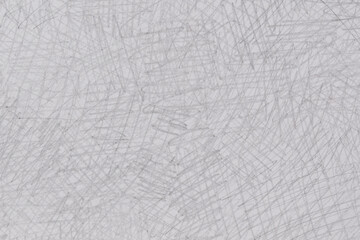 gray pencil doodles on paper background texture