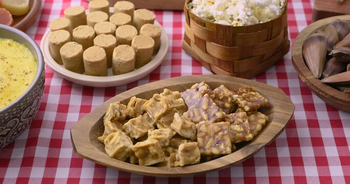 Typical brazilian june festival food over red plaid fabric. Festa junina