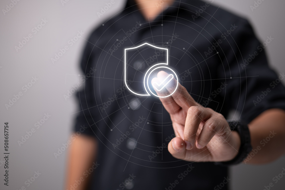 Fototapete Secure access system idea with certified guarantee approval: A businessman presses the screen identity proving symbol for security protection. A guarantee from a company financial resources.