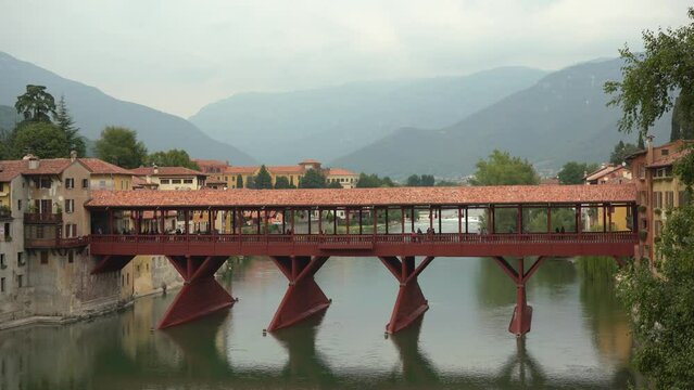 The Alpini's Bridge, or "Old bridge", covered wooden pontoon bridge designed by the architect Andrea Palladio in 1569, in Bassano del Grappa, Veneto region, Italy