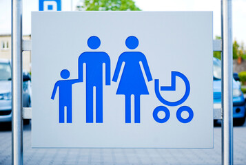 Parent and child parking sign.