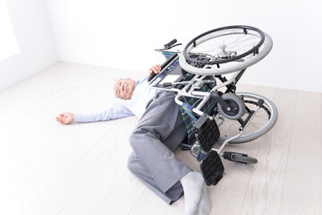 Senior man fall from the wheelchair
