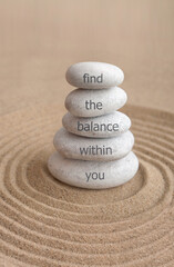 Fototapeta na wymiar Find the balance within you yoga zen stones