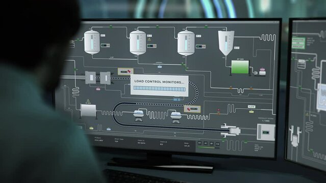 Operating the control panel of the modern manufacturing equipment. Using the control panel of the manufacturing machinery. Control panel of the automated machines at the manufacturing plant.