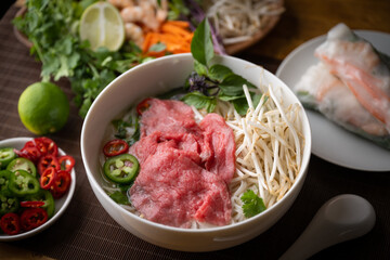 authentic vietnamese pho rice noodle with raw beef
