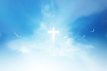 Christian faith A miracle happened on the background of the sky. A large number of fluffy clouds were separated appeared in the form of a cross in the middle of the sky. The bright and powerful ligh