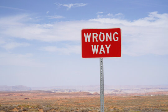 wrong way sign in front of desert view