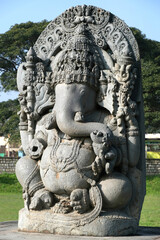 Fototapeta premium Huge stone Ganesha statue at western entrance of Hoysaleswara temple, Halebidu temple, Halebidu, Hassan District of Karnataka state, India. The temple was built in 12th-century rule of Hoysala Empire.