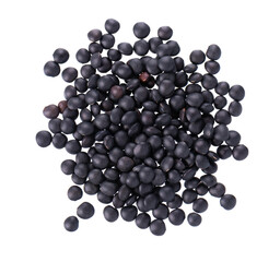 Black lentils isolated on white background. Dry beluga lentil grains pile. Top view.