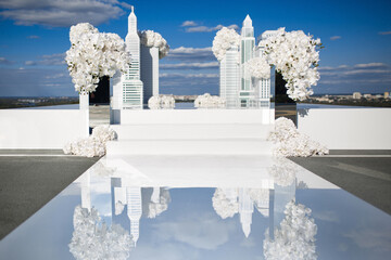 Outdoor wedding ceremony with orchids and skyscrapers