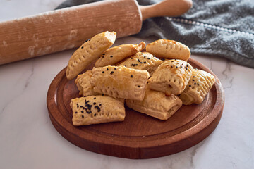 Sandwiches for events made of puff pastry and filled with cheese