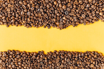 coffee beans isolated on yellow background