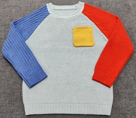 Sweater on a white. Multi Stripes colorful and pocket knitted stylish boys sweater and cardigan...