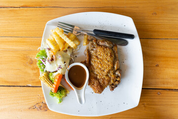 Roast Steak, Baked Potatoes and Vegetables
