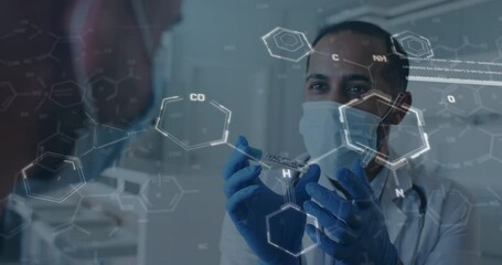 Animation of chemical structures and data processing over biracial male doctor with face mask - Powered by Adobe