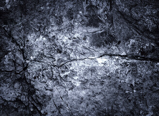 Rock surface with cracks. Rock texture. Silver Wall. Rock background. Black texture. Dark marble. Stone background. Rock pile. Paint spots. Grunge Rough structure. Abstract texture.