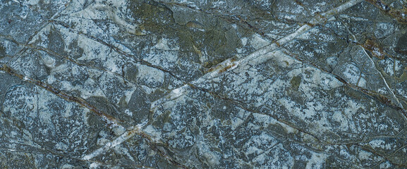 Stone background. Rock pile. Paint spots. Dark marble. Silver Wall. Rock background. Rock texture. Black texture. Rock surface with cracks. Grunge Rough structure. Abstract texture.