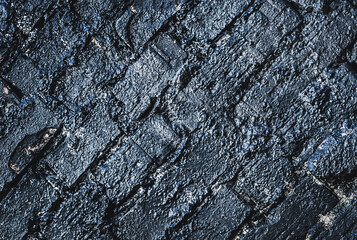 Brick Wall. Silver Rock background. Rock texture. Black texture. Dark marble. Stone background. Rock pile. Paint spots. Rock surface with cracks. Grunge Rough structure. Abstract texture.