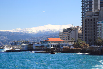 Naklejka premium Beirut skyline with snow covered Mt Sannine in the background