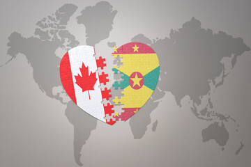 puzzle heart with the national flag of canada and grenada on a world map background.Concept.