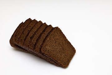 a cut piece of black bread without a knife