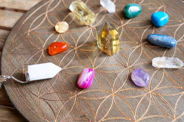 Healing crystals on brown background