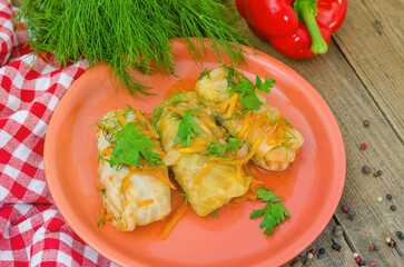 Three stuffed cabbage rolls on the plate