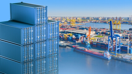 Cargo containers in seaport. Forty-foot containers for cargo ship. Concept of transportation of goods by sea. Selective focus. Large seaport with cranes for loading containers. Cargo ships in harbor