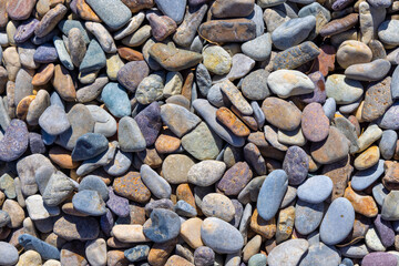 Top down view of colorful pebbles for background use. 