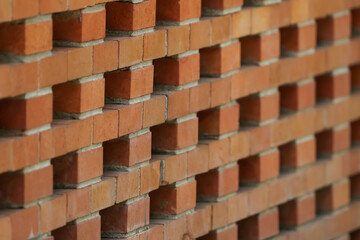 Close up view of alternate brick constructed wall, selective focus