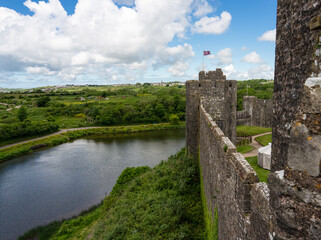 Fototapeta premium looking across Pembroke river from the stunning Pembroke Castle, an 11th Century Welsh fortress