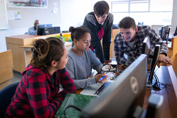 Students working together during computer science lesson