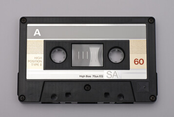 Compact cassette SA 60 High Position chrome. Black plastic.