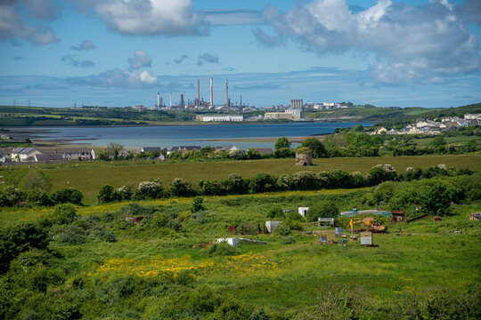 view toward Pembroke Power Station, blue sky and white cloud