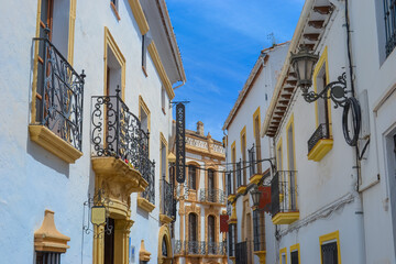 Ronda, Spain, 25.05.2022: Ronda Old Town Casco Antiguo. Old town with its white architecture, narrow streets, white buildings, balconies.