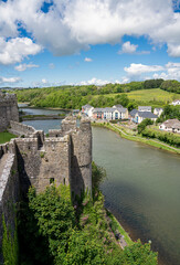 Fototapeta na wymiar view from the top of 80 foot high keep at the stunning Pembroke Castle, looking across Pembroke river, blue sky background