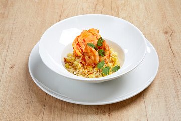 Yellow fried rice with shrimp and herbs