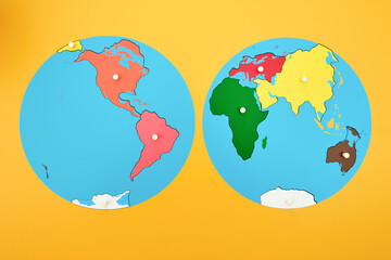 Flat world map, brightly colored montessori educational material.
