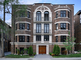 Small old three story brick apartment building