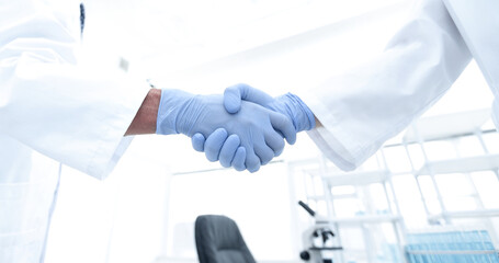 hand in the medical glove (handshake)