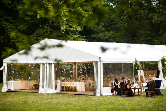 Large Wedding Awning And A Group Of Musicians