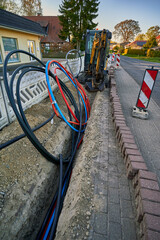 Fototapeta premium fiber laying for high speed internet construction site